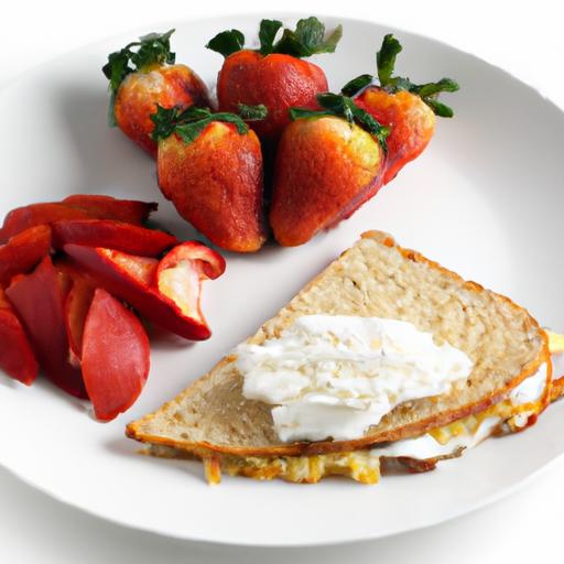 a plate of food with a sandwich and strawberries